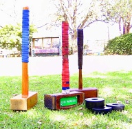 Three Trugo mallets and four rings. John McMahon's mallet (centre) Yarraville Trugo Club 2008