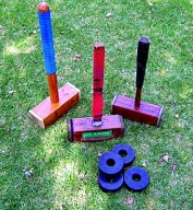 Three Trugo mallets and four rings. John McMahon's mallet (centre) Yarraville Trugo Club 2008