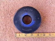 The 350 grams Trugo ring is made of solid rubber that is 1.5" wide and 4" in diameter. The hole in the center is 11/8" in diameter.